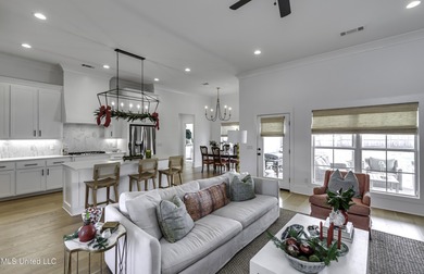 This welcoming Lake Caroline Home in Madison, MS offers high on Lake Caroline Golf Club in Mississippi - for sale on GolfHomes.com, golf home, golf lot