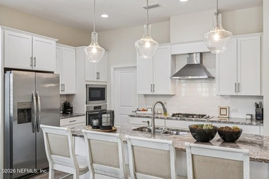 Welcome to this beautiful 4-bed 3-bath home with an office/flex on Palm Valley Golf Club in Florida - for sale on GolfHomes.com, golf home, golf lot