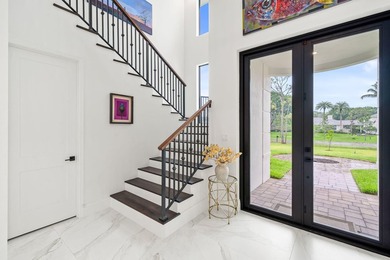 Step into your own private resort compound in Palm Beach Country on Jupiter Country Club in Florida - for sale on GolfHomes.com, golf home, golf lot