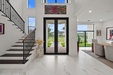 Step into your own private resort compound in Palm Beach Country on Jupiter Country Club in Florida - for sale on GolfHomes.com, golf home, golf lot