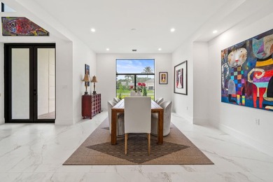 Step into your own private resort compound in Palm Beach Country on Jupiter Country Club in Florida - for sale on GolfHomes.com, golf home, golf lot