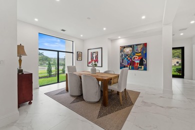 Step into your own private resort compound in Palm Beach Country on Jupiter Country Club in Florida - for sale on GolfHomes.com, golf home, golf lot