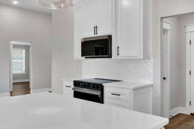 Welcome to this beautifully designed 3-bedroom, 2-bath home on Wood Hollow Golf  Course in Texas - for sale on GolfHomes.com, golf home, golf lot