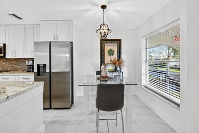 Step into luxury living with this recently and beautifully on Villa Del Ray Golf Club in Florida - for sale on GolfHomes.com, golf home, golf lot