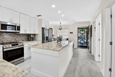 Step into luxury living with this recently and beautifully on Villa Del Ray Golf Club in Florida - for sale on GolfHomes.com, golf home, golf lot