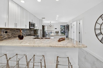 Step into luxury living with this recently and beautifully on Villa Del Ray Golf Club in Florida - for sale on GolfHomes.com, golf home, golf lot