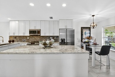 Step into luxury living with this recently and beautifully on Villa Del Ray Golf Club in Florida - for sale on GolfHomes.com, golf home, golf lot