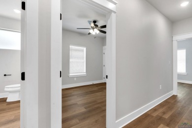 Welcome to this beautifully designed 3-bedroom, 2-bath home on Wood Hollow Golf  Course in Texas - for sale on GolfHomes.com, golf home, golf lot