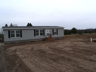 Three Bedroom Two Bathroom Ranch Home That Joins the Wildwood on Wildwood Lakes in Michigan - for sale on GolfHomes.com, golf home, golf lot