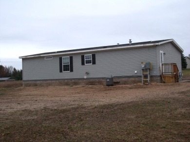 Three Bedroom Two Bathroom Ranch Home That Joins the Wildwood on Wildwood Lakes in Michigan - for sale on GolfHomes.com, golf home, golf lot