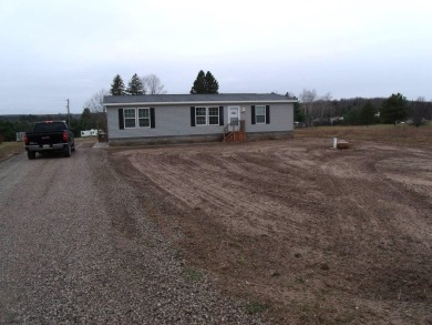 Three Bedroom Two Bathroom Ranch Home That Joins the Wildwood on Wildwood Lakes in Michigan - for sale on GolfHomes.com, golf home, golf lot