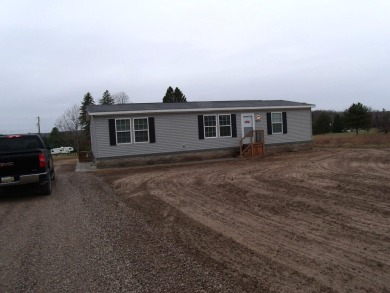 Three Bedroom Two Bathroom Ranch Home That Joins the Wildwood on Wildwood Lakes in Michigan - for sale on GolfHomes.com, golf home, golf lot