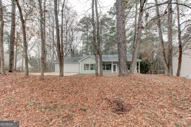 Perfect for first-time buyers! This charming 3-bedroom on Turtle Cove Golf Course in Georgia - for sale on GolfHomes.com, golf home, golf lot