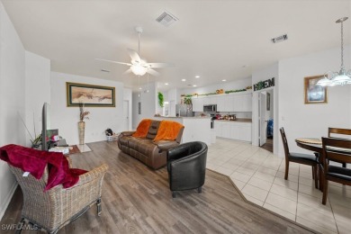 Beautiful 3 bedroom/2bath/2car garage. Wide open lot outside on Lehigh Resort Club in Florida - for sale on GolfHomes.com, golf home, golf lot