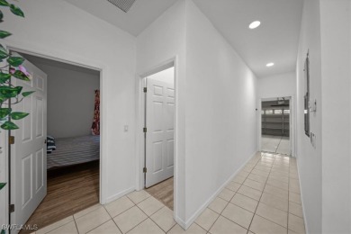 Beautiful 3 bedroom/2bath/2car garage. Wide open lot outside on Lehigh Resort Club in Florida - for sale on GolfHomes.com, golf home, golf lot
