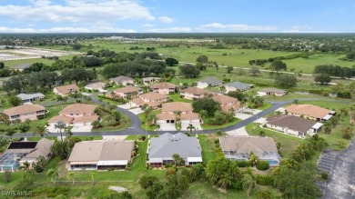 Beautiful 3 bedroom/2bath/2car garage. Wide open lot outside on Lehigh Resort Club in Florida - for sale on GolfHomes.com, golf home, golf lot