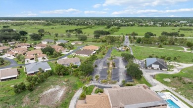 Beautiful 3 bedroom/2bath/2car garage. Wide open lot outside on Lehigh Resort Club in Florida - for sale on GolfHomes.com, golf home, golf lot