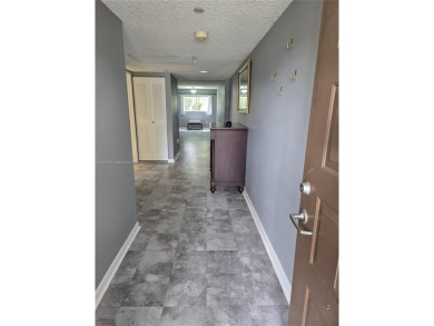 Nicely maintained large 1 bedroom, 1.5 bathrooms in a gated 55+ on Flamingo Lakes Country Club in Florida - for sale on GolfHomes.com, golf home, golf lot