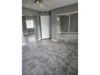 Nicely maintained large 1 bedroom, 1.5 bathrooms in a gated 55+ on Flamingo Lakes Country Club in Florida - for sale on GolfHomes.com, golf home, golf lot