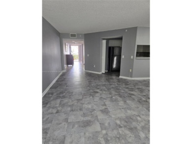 Nicely maintained large 1 bedroom, 1.5 bathrooms in a gated 55+ on Flamingo Lakes Country Club in Florida - for sale on GolfHomes.com, golf home, golf lot