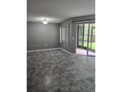Nicely maintained large 1 bedroom, 1.5 bathrooms in a gated 55+ on Flamingo Lakes Country Club in Florida - for sale on GolfHomes.com, golf home, golf lot