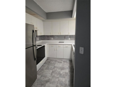 Nicely maintained large 1 bedroom, 1.5 bathrooms in a gated 55+ on Flamingo Lakes Country Club in Florida - for sale on GolfHomes.com, golf home, golf lot