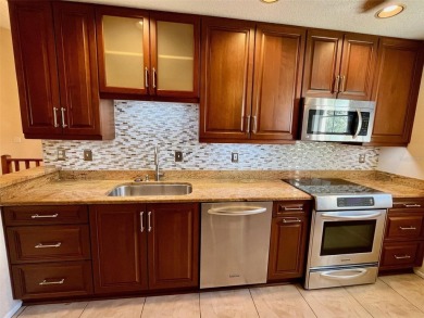 Enjoy the expansive golf course views from this spacious 3 on Tara Golf and Country Club in Florida - for sale on GolfHomes.com, golf home, golf lot