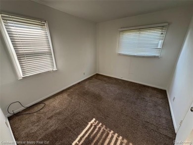 CUTE COZY 3 BEDROOM RANCH. LOCATED RIGHT ACROSS THE STREET FROM on The Links At Crystal Lake in Michigan - for sale on GolfHomes.com, golf home, golf lot