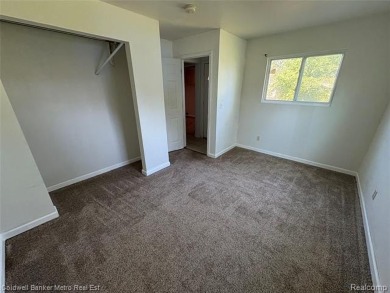 CUTE COZY 3 BEDROOM RANCH. LOCATED RIGHT ACROSS THE STREET FROM on The Links At Crystal Lake in Michigan - for sale on GolfHomes.com, golf home, golf lot