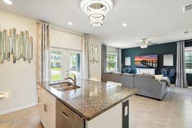 This stunning 2022 modern home in Venetian Bay is priced under on Venetian Bay Golf Course in Florida - for sale on GolfHomes.com, golf home, golf lot