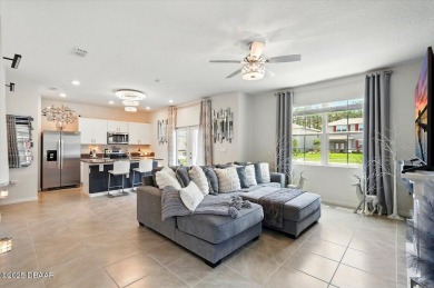 This stunning 2022 modern home in Venetian Bay is priced under on Venetian Bay Golf Course in Florida - for sale on GolfHomes.com, golf home, golf lot