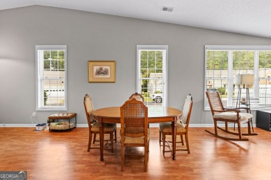 Welcome home to this charming 2-bedroom, 2-bath end-unit cottage on Braelinn Golf Club in Georgia - for sale on GolfHomes.com, golf home, golf lot
