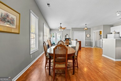 Welcome home to this charming 2-bedroom, 2-bath end-unit cottage on Braelinn Golf Club in Georgia - for sale on GolfHomes.com, golf home, golf lot