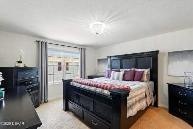 This stunning 2022 modern home in Venetian Bay is priced under on Venetian Bay Golf Course in Florida - for sale on GolfHomes.com, golf home, golf lot