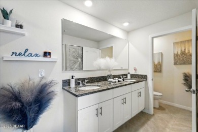 This stunning 2022 modern home in Venetian Bay is priced under on Venetian Bay Golf Course in Florida - for sale on GolfHomes.com, golf home, golf lot