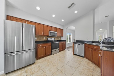Well-maintained 2 bedroom 2 full bathrooms home nestled in on Tampa Bay Golf and Country Club in Florida - for sale on GolfHomes.com, golf home, golf lot
