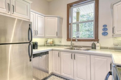 Aiglon prestigious center unit  townhome with upgrades, spacious on Golf Manitou in  - for sale on GolfHomes.com, golf home, golf lot