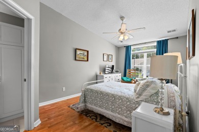 Welcome home to this charming 2-bedroom, 2-bath end-unit cottage on Braelinn Golf Club in Georgia - for sale on GolfHomes.com, golf home, golf lot