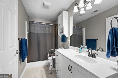 Welcome home to this charming 2-bedroom, 2-bath end-unit cottage on Braelinn Golf Club in Georgia - for sale on GolfHomes.com, golf home, golf lot