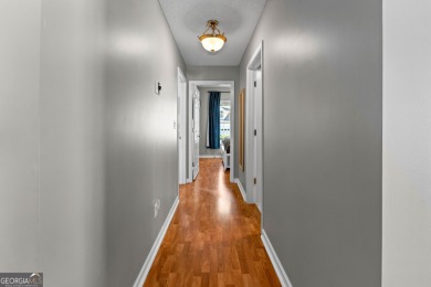Welcome home to this charming 2-bedroom, 2-bath end-unit cottage on Braelinn Golf Club in Georgia - for sale on GolfHomes.com, golf home, golf lot