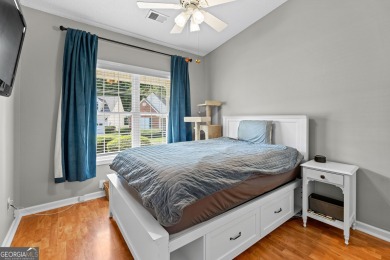 Welcome home to this charming 2-bedroom, 2-bath end-unit cottage on Braelinn Golf Club in Georgia - for sale on GolfHomes.com, golf home, golf lot