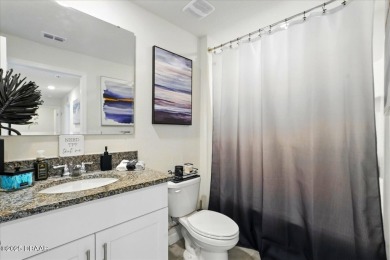 This stunning 2022 modern home in Venetian Bay is priced under on Venetian Bay Golf Course in Florida - for sale on GolfHomes.com, golf home, golf lot
