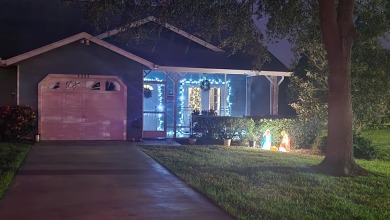 ENJOY THIS SPACIOUS CORNER VILLA OFFERING ITS INCREASED PRIVACY on Gator Trace Golf and Country Club in Florida - for sale on GolfHomes.com, golf home, golf lot