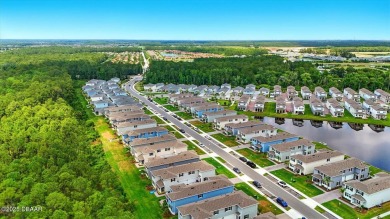 This stunning 2022 modern home in Venetian Bay is priced under on Venetian Bay Golf Course in Florida - for sale on GolfHomes.com, golf home, golf lot