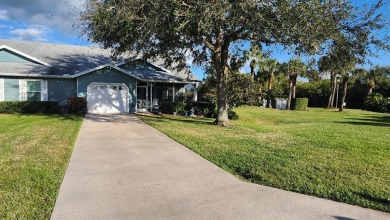 ENJOY THIS SPACIOUS CORNER VILLA OFFERING ITS INCREASED PRIVACY on Gator Trace Golf and Country Club in Florida - for sale on GolfHomes.com, golf home, golf lot