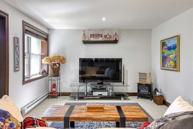 Aiglon prestigious center unit  townhome with upgrades, spacious on Golf Manitou in  - for sale on GolfHomes.com, golf home, golf lot