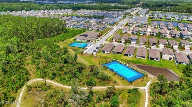 This stunning 2022 modern home in Venetian Bay is priced under on Venetian Bay Golf Course in Florida - for sale on GolfHomes.com, golf home, golf lot