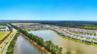 This stunning 2022 modern home in Venetian Bay is priced under on Venetian Bay Golf Course in Florida - for sale on GolfHomes.com, golf home, golf lot