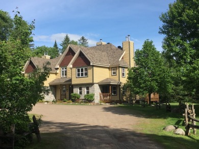 Aiglon prestigious center unit  townhome with upgrades, spacious on Golf Manitou in  - for sale on GolfHomes.com, golf home, golf lot