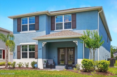 This stunning 2022 modern home in Venetian Bay is priced under on Venetian Bay Golf Course in Florida - for sale on GolfHomes.com, golf home, golf lot